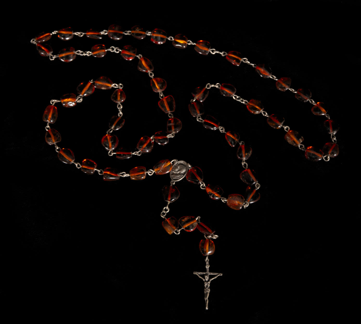 Rosary in silver and amber, 19th century