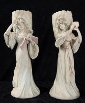 Pair of women's biscuit bucaros with book and tambourine, Italian school, 19th - 21st centuries