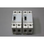 2 UNUSED SIEMENS 20A CIRCUIT BREAKERS