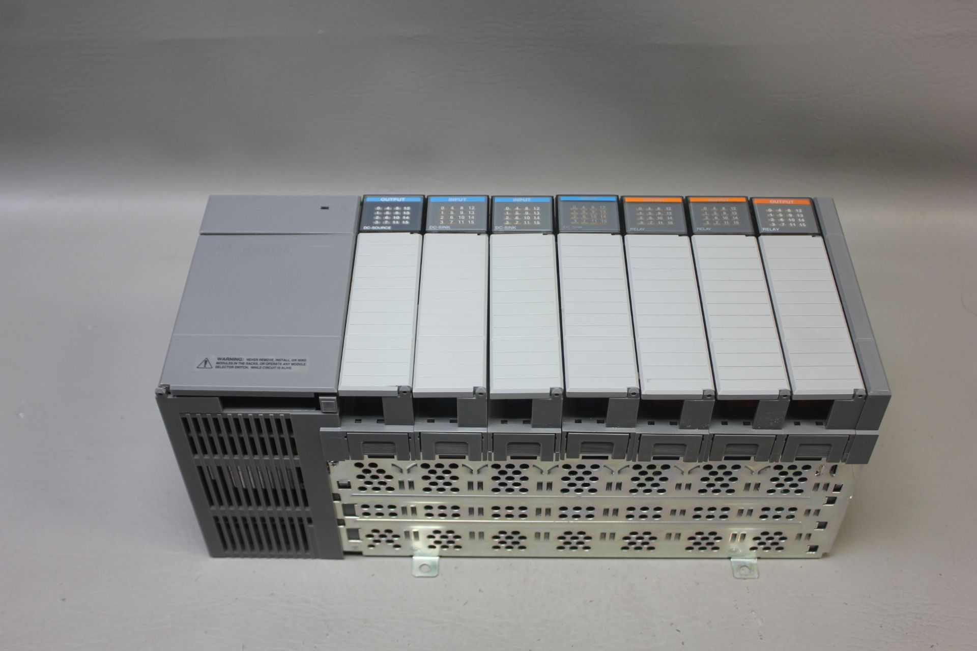 ALLEN BRADLEY 7 SLOT PLC CHASSIS WITH MODULES