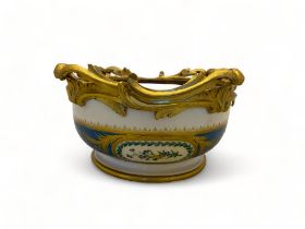 A 19th century Sèvres style bleu celeste gilt bronze mounted porcelain bowl