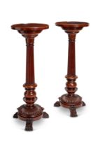 A pair of large 19th century mahogany torcheres