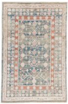 A Khotan silk and wool carpet