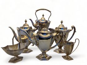 An Edwardian silver neo-classical style tea service, Walker and Hall, Sheffield, 1909