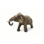 A silver model Asian elephant in walking pose, Carrs of Sheffield Ltd, Sheffield,1999