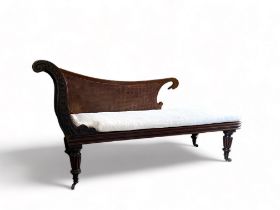 A Regency carved mahogany day bed in the manner of Gillows