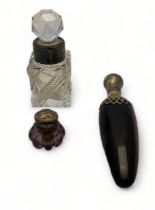 Two Victorian silver topped scent bottles and a small salts bottle