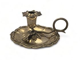 A William IV silver chamberstick with sconce cover, Charles Reily and George Storer, London, 1836
