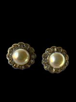 A pair of mid-20th century cultured pearl and white stone cluster earrings
