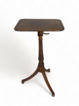 A fine Regency mahogany and rosewood crossbanded reading / occasional table