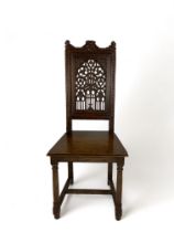 A 19th century French Gothic carved oak side chair
