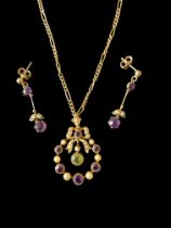 An Edwardian amethyst, peridot and pearl ribbon bow and garland pendant and matched earrings