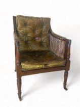 A Regency mahogany bergere armchair attributed to Gillows