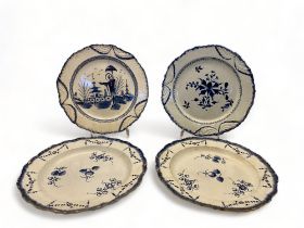 A matched set of four 18th century English pearlware blue and white plates, probably Liverpool