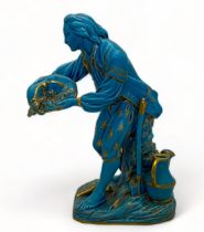 A 19th century Minton turquoise and gilt porcelain figure of 'Le jardinier au plantoir' in the Sèvre