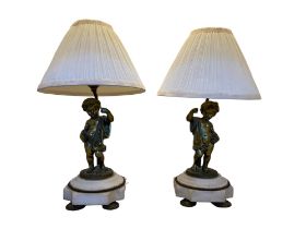 A pair of late 19th century Louis XVI style gilt bronze cherubs, converted to table lamps