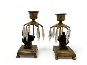 A pair of 19th century gilt bronze and patinated bronze Chinese figural lustre candlesticks