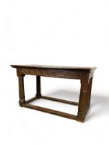 A 17th century style oak kitchen table