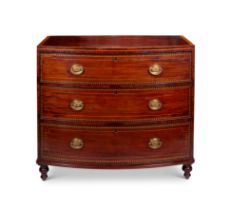 A Regency Channel Islands mahogany, satinwood and ebony marquetry bowfront marquetry chest
