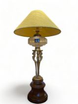 A 19th century gilt bronze oil lamp, converted to a table lamp