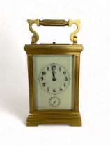 A French quarter-striking brass carriage clock