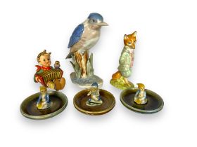 A group of collectable ceramics including Wade, Hummel & Beswick