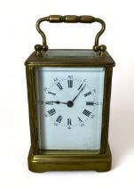 A gilt brass carriage timepiece