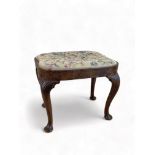 A Queen Anne carved walnut stool