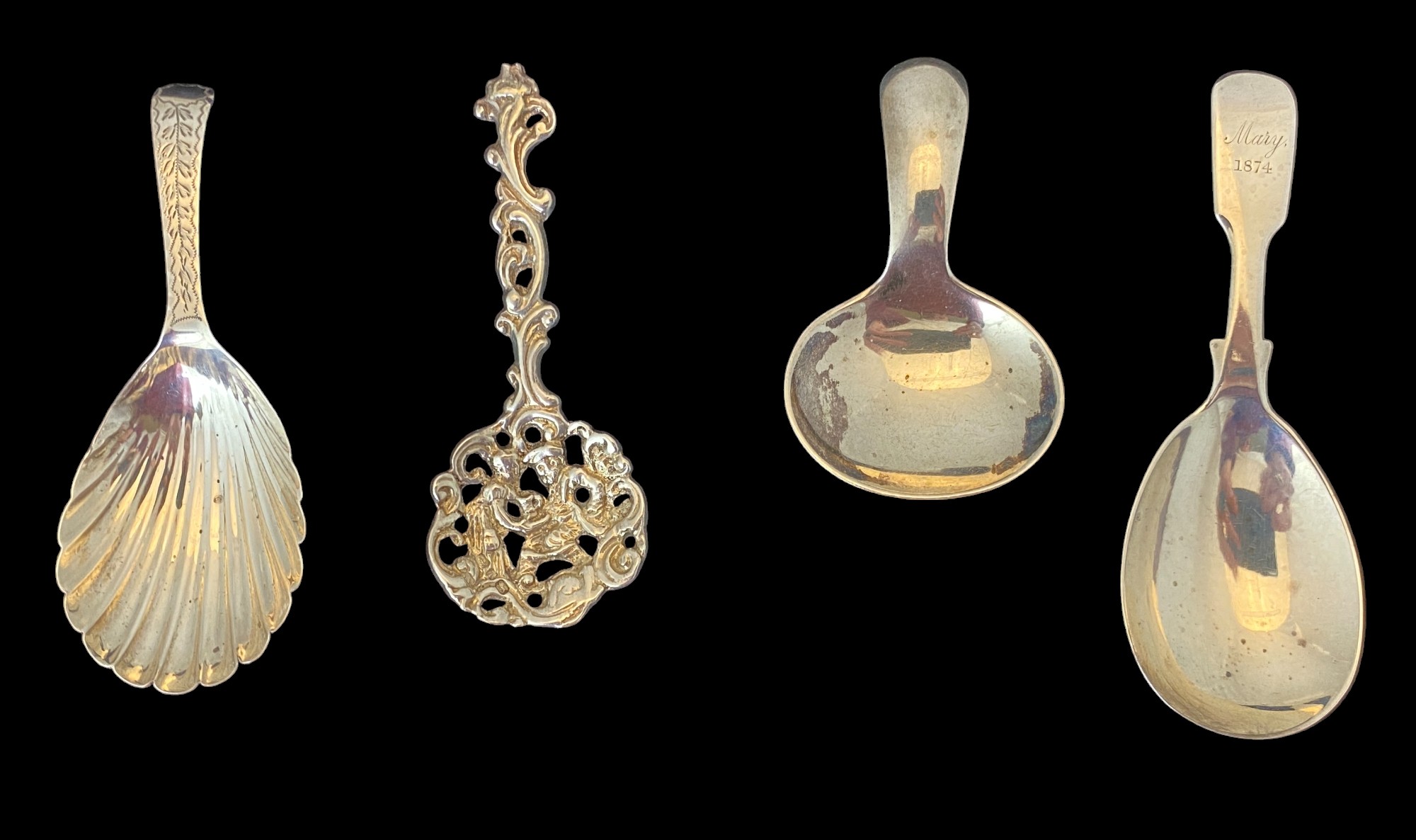 A group of four silver caddy spoons