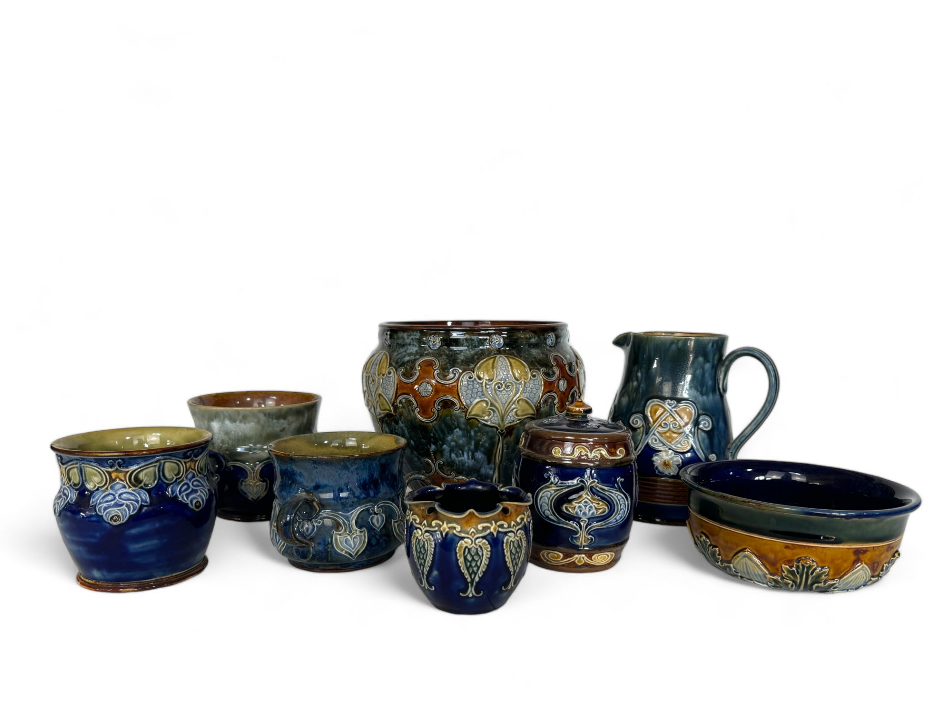 A group of Royal Doulton tube-lined decorated pottery