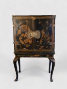 An early 18th century Chinese export black lacquer cabinet on a European stand