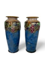 A pair of Royal Doulton tube-lined vases