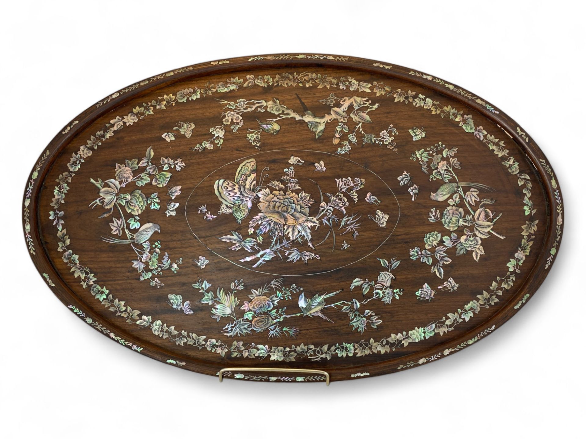 A late 19th century Chinese mother-of-pearl inlaid hardwood oval tray