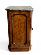 A Victorian burr walnut marble topped pot cupboard