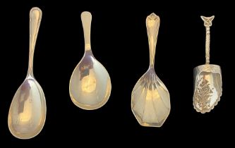 A group of four silver caddy spoons