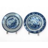 A 19th century Chinese blue and white peony pattern plate and a 19th century Chinese willow pattern