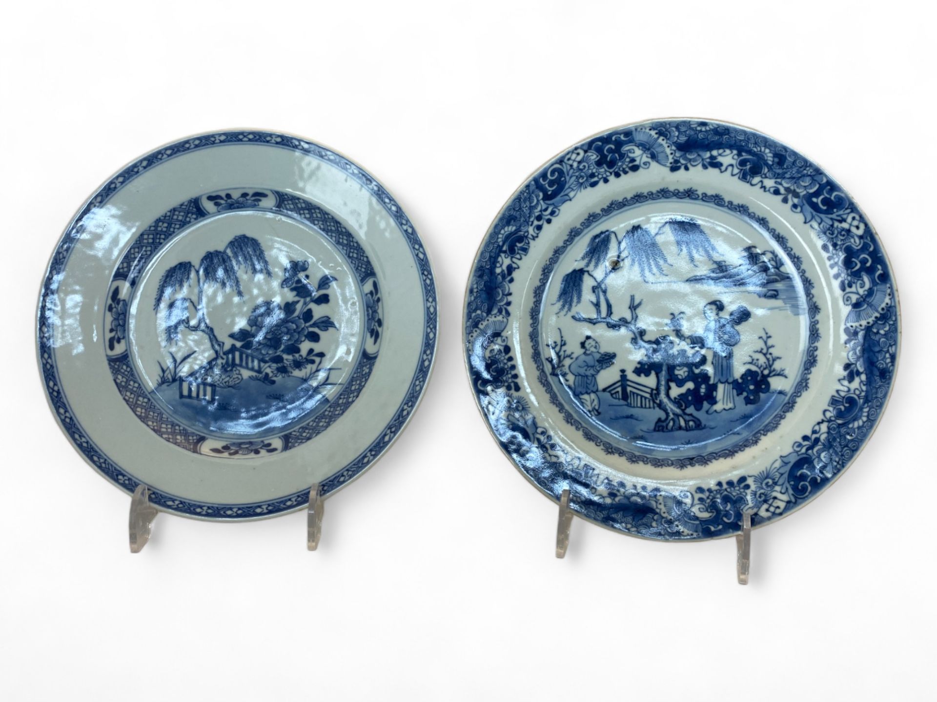 A 19th century Chinese blue and white peony pattern plate and a 19th century Chinese willow pattern