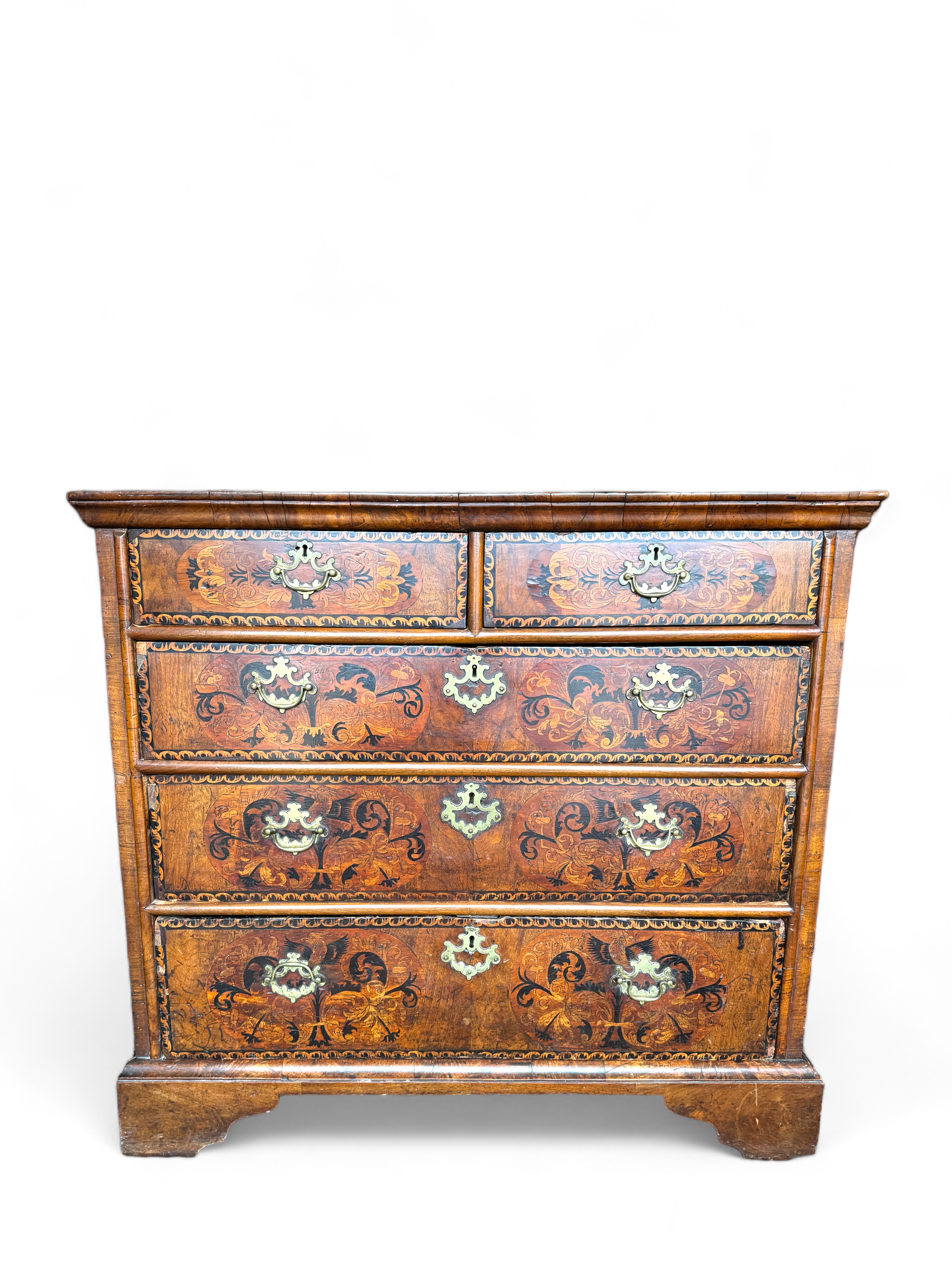 A William and Mary walnut, oak, sycamore and ebony marquetry chest