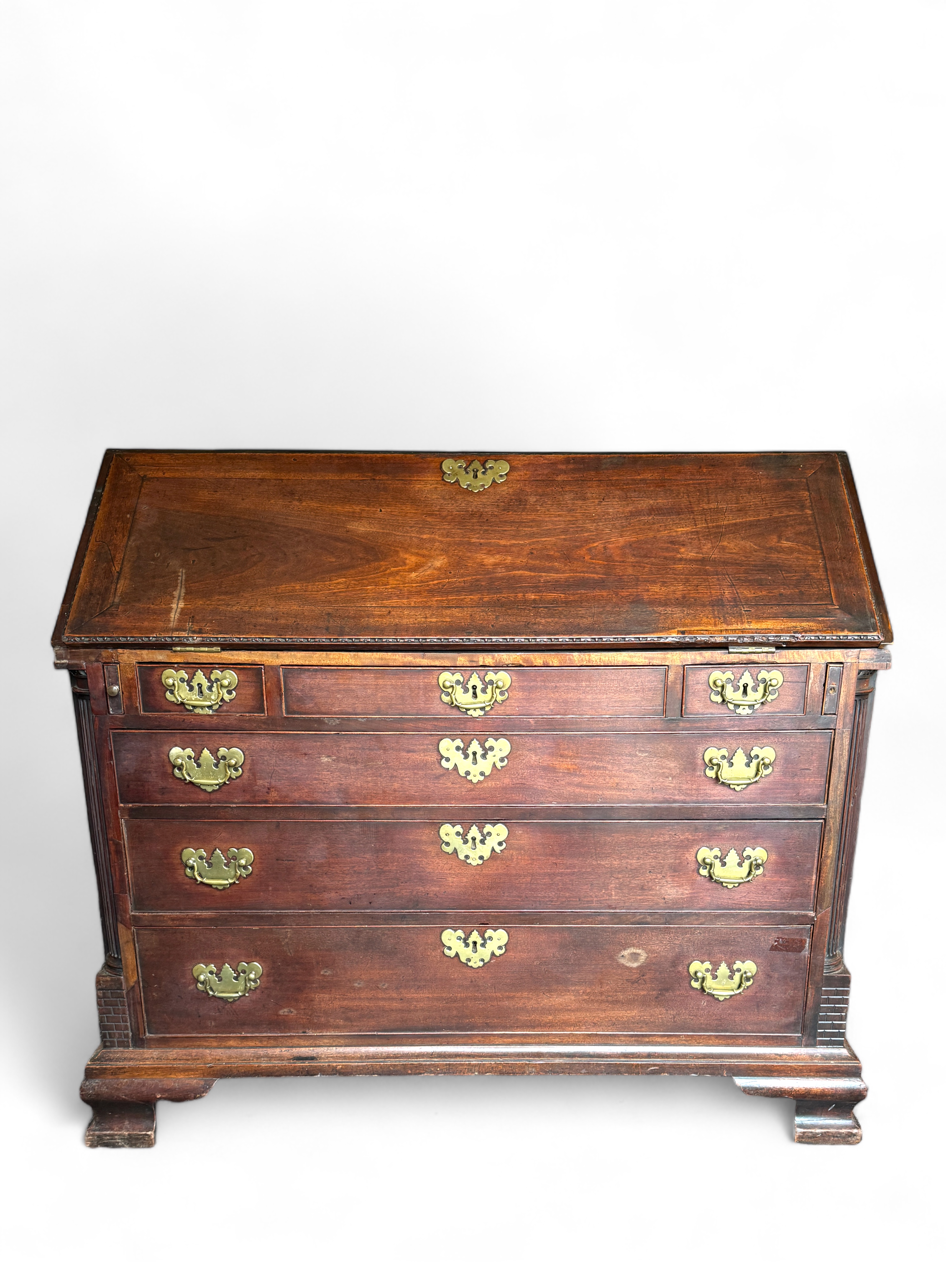 A George III mahogany carved bureau