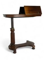 A Victorian rosewood rising reading table
