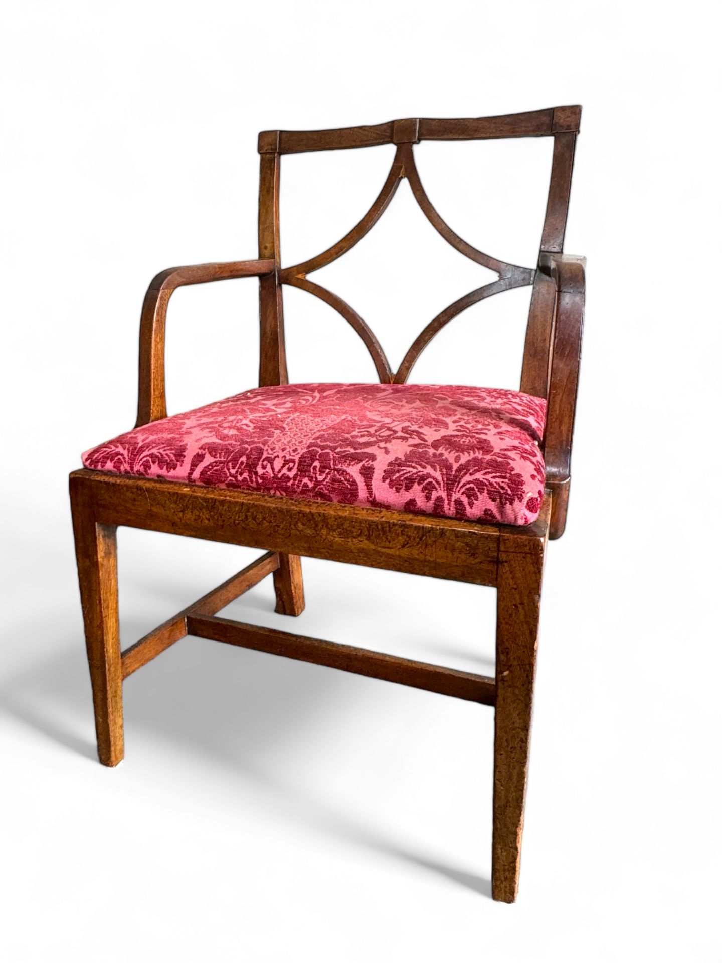 A provincial George III mahogany open armchair