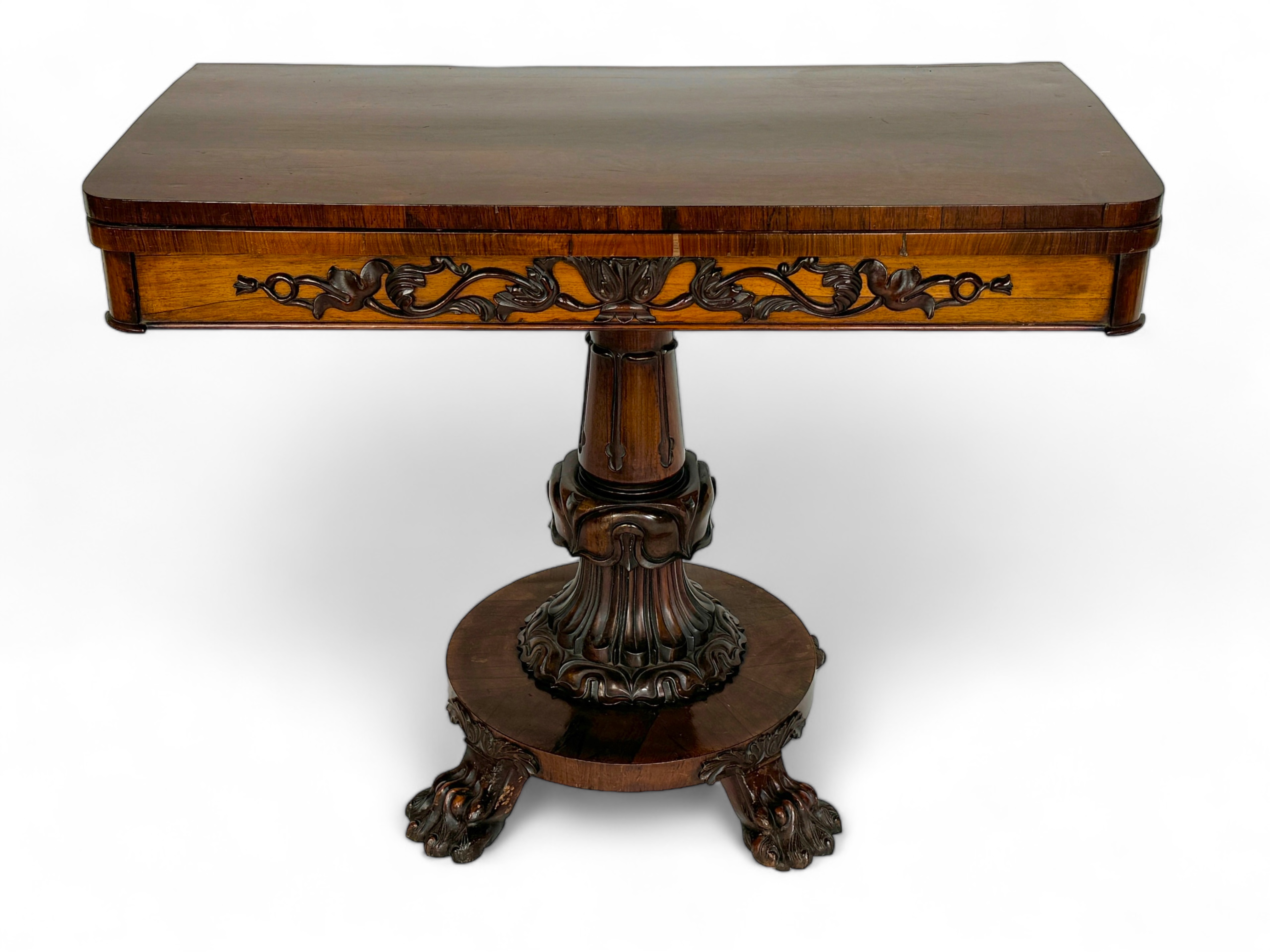 A Victorian rosewood card table