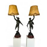 After Emile Picault (French, 1833-1915) A large and impressive pair of patinated spelter classical m