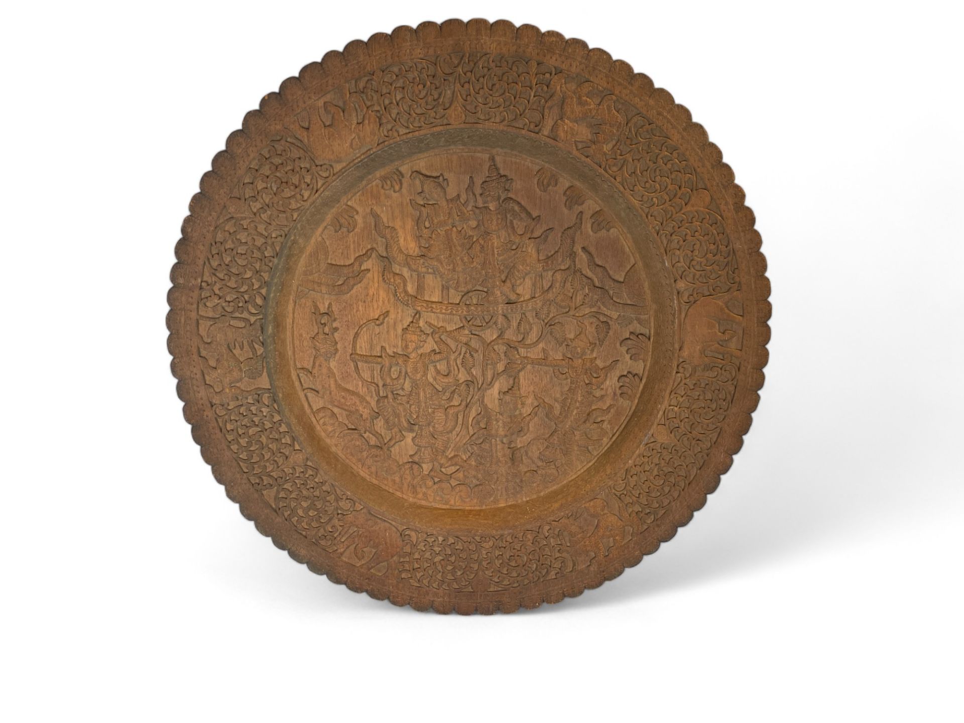 An early 20th century carved Burmese dinner gong, a Burmese large carved hardwood circular tray and - Image 12 of 13