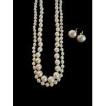 Two graduated cultured pearl necklaces, 9ct gold clasps