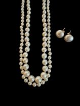 Two graduated cultured pearl necklaces, 9ct gold clasps