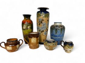 A group of variously decorated Royal Doulton pottery