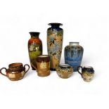 A group of variously decorated Royal Doulton pottery