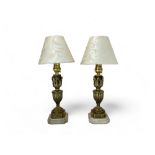 A pair late 19th /early 20th century French small gilt brass candlesticks converted to table lamps