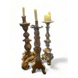 Three Renaissance style candlesticks
